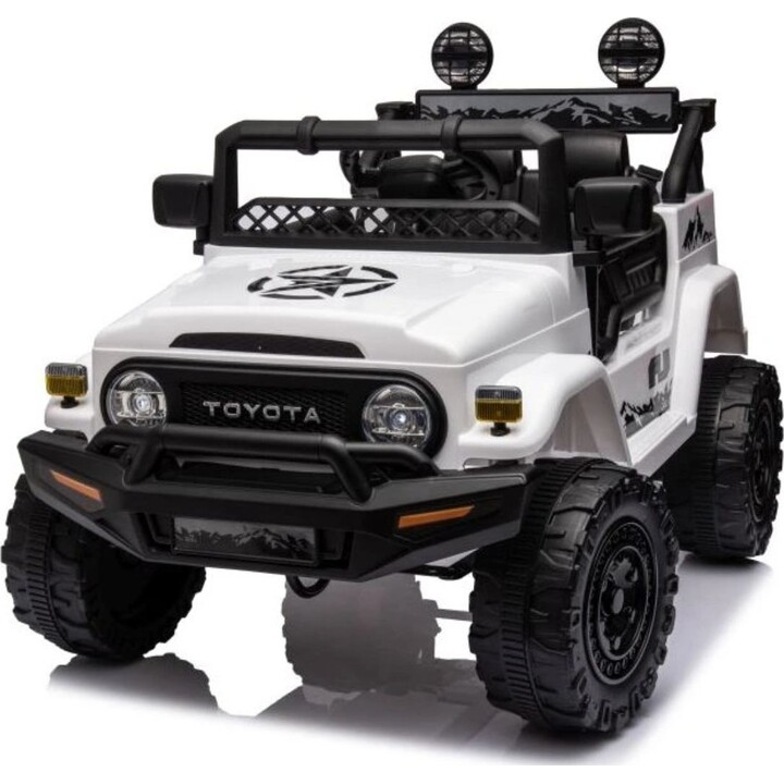 White Toyota FJ 4x4 with battery