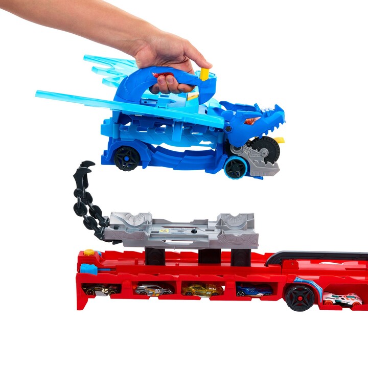 Hot Wheels City ultimativer 2-in-1 Drachentransporter und 2 Spielzeugautos im Maßstab 1:64