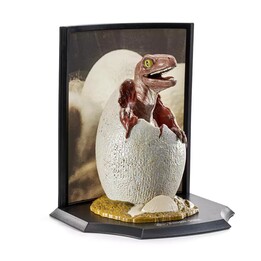 The Noble Collection Toyllectible Treasures Jurassic Park - Figura Ovo de Raptor a Eclodir, resina pintada à mão, 15 cm, com cer